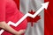 Canadian pregnant woman on flag of Canada background. Birth rate up