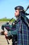 Canadian soldier playing bagpipe in Citadel Hill Fort George