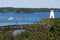 Canadian Wooden Lighthouse Overlooks Harbor