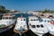 CANAKKALE, TURKEY - AUGUST 14, 2017: Fishing boats in the Canakkale harbor, Turkey. Canakkale town waterfront