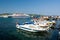 CANAKKALE, TURKEY - AUGUST 14, 2017: Fishing boats in the Canakkale harbor, Turkey. Canakkale town waterfront