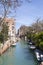 Canal alongside the Giardini Pubblici, or Public Gardens, Castello, Venice, Veneto, Italy