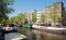 Canal of Amsterdam, houses boats