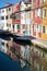 Canal, boats and reflections, Burano, Italy