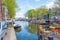 Canal in the city of Amsterdam in spring