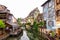 Canal and colorful houses in Petite Venice, Colmar, France.