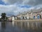 Canal cottages and cloudy sky