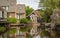 Canal in dutch village Broek in Waterland, a popular tourist destination