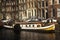 Canal and houseboat in Amsterdam, Holland