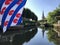 Canal in IJlst with a frisian flag