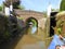 Canal narrowboat leaving lock