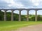 Canal narrowboat passing over aqueduct