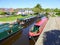 Canal narrowboats moored in canal basin