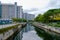 The canal in Singapore is clean and shady