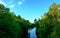 A canal surrounded by trees