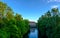 A canal surrounded by trees