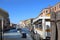 Canal in Venice and Three Arches bridge