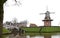 Canal and windmill on fortifications of fortified town of Dokkum, Friesland,