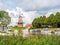 Canal and windmill on fortifications of fortified town of Dokkum, Friesland, Netherlands