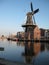 A canal and windmill view in Haarlem