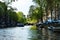 Canals in Amsterdam, Netherlands, Europe and colorful buildings