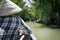 The canals in the Mekong Delta are surrounded by jungles and mangroves. Vietnamese rowing boats on canal waters