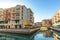 Canals of Venice like Qanat Quartier at the Pearl in Doha, Qatar in a late afternoon.