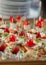 Canape appetizers with strawberries and Brie soft cheese