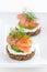 Canape with cheese, cucumber and salmon, vertical