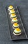 Canape with fried quail eggs