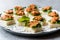 Canape with Muhammara, Adjika, Ajika or Acuka on Small Square Breads with Round Plate.