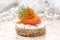 Canape with rye bread, cream cheese, salmon and dill