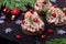 Canape shaped as a Christmas tree with pate garnished with pomegranate and dill