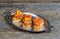 Canape with smoked salmon on plate, selective focus, low angle view