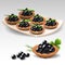 Canapes with black caviar