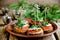 Canapes with rye bread, salted herring fillet, mustard, onion, tomato