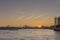 Canary wharf riverside sunset cloudscape view, London city.