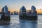 Canary wharf and Thames Barrier at dusk, London UK