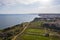 Canavial Beach. Portuguese southern golden coast cliffs. Aerial view over city of Lagos in Algarve