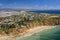 Canavial Beach. Portuguese southern golden coast cliffs. Aerial view over city of Lagos in Algarve, Portugal