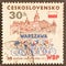 Cancelled postage stamp printed by Czechoslovakia, that shows Cyclists at Warsaw