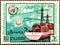 Cancelled postage stamp printed by Dubai, that shows Ocean Weather Ship Launching Radio Sonde, and Hastings Plane, World Day of Me