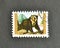 Cancelled postage stamp printed by Umm al-Qiwain, that shows Spectacled Bear