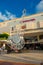 CANCUN, MEXICO - JANUARY 10, 2018: Unidentified people at outdoors next to Hard Rock Cafe metallic guitar structure in