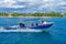 CANCUN, MEXICO - JANUARY 10, 2018: Unidentified people sailing in a yatch Outdoor view of huge boat of color blue and