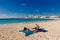 Cancun, Quintana Roo, Mexico. girls sunbathe on the beach in sunny weather