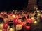 Candels lit during all saints night or halloween at european cemetery.