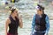 Candid lifestyle photo of two women, including a senior woman, snorkeling together at an outdoor resort.