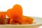 Candied fruit jelly apricot in the form of heart on isolated background