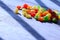 Candied fruits on the white table. Sweets